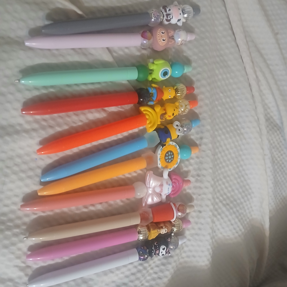 Gray and Red Character-Themed Toy Pens